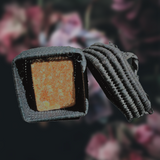 Amber-Musk fragrance stone in a crocheted raffia gift box
