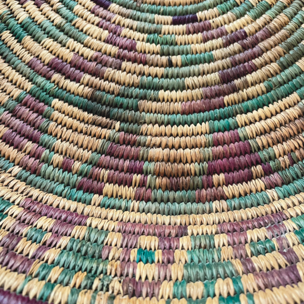 Vintage Berber basket made of colorful reeds Morocco